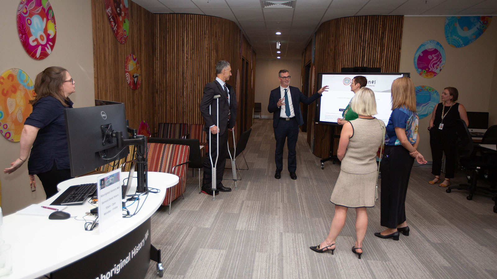 Minister Buti visits the new space at the Aboriginal History Western Australia (AHWA) unit, and speaks with staff