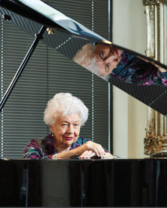 Stephanie Coleman sitting at the piano