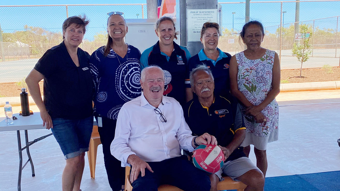 Minister Mick Murray with people at the Broome basketball courts