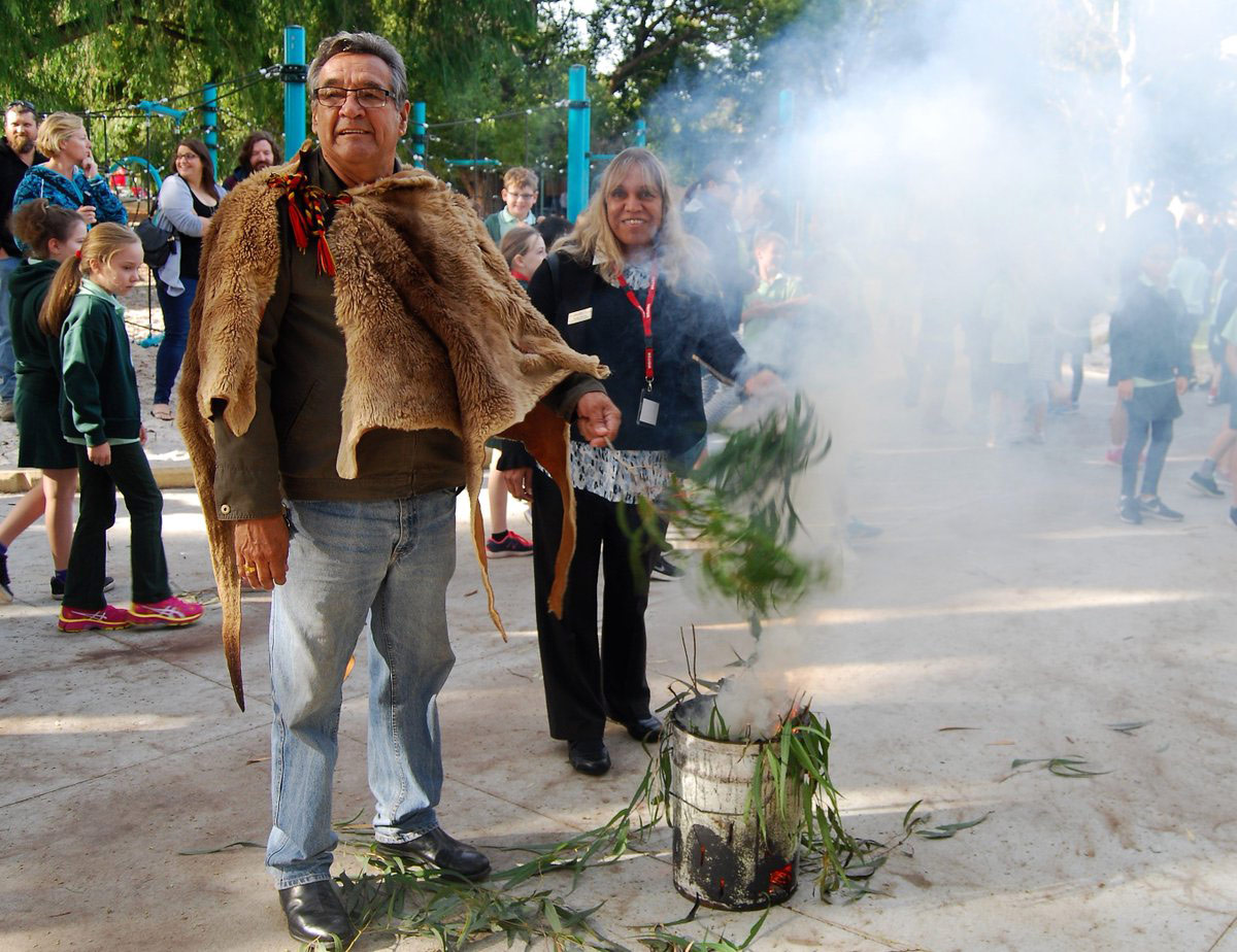 Community elder, Neville Collard doing a smoking ceremony