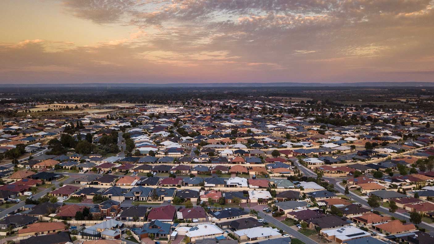 High angle view of a townscape against sky during sunset