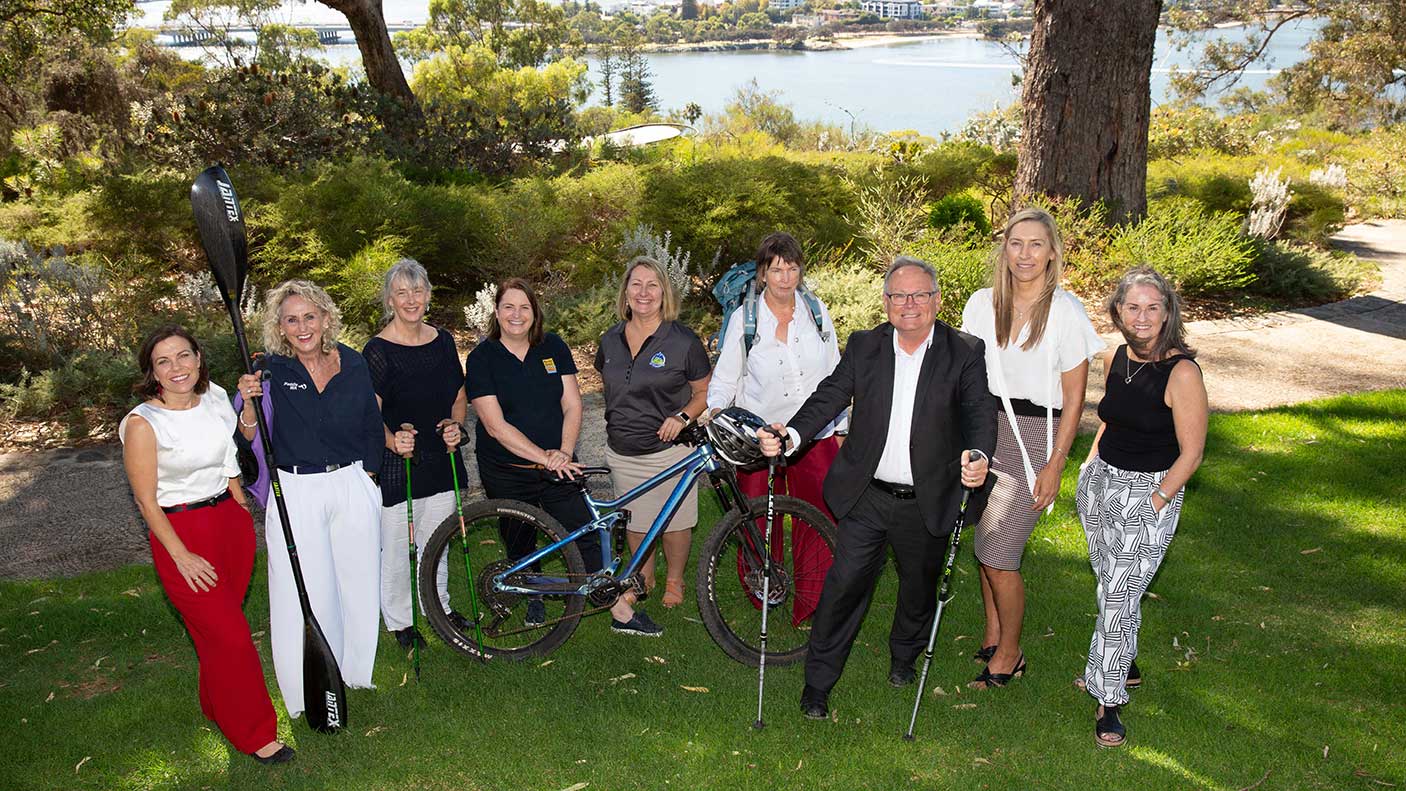 Women standing together with the Minister of Sport and Recreation in Kings Park, Perth.