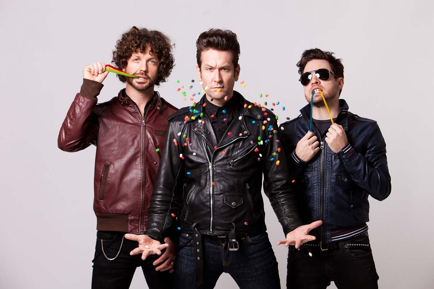 A studio promotional photo of 3 members of Eskimo Joe.