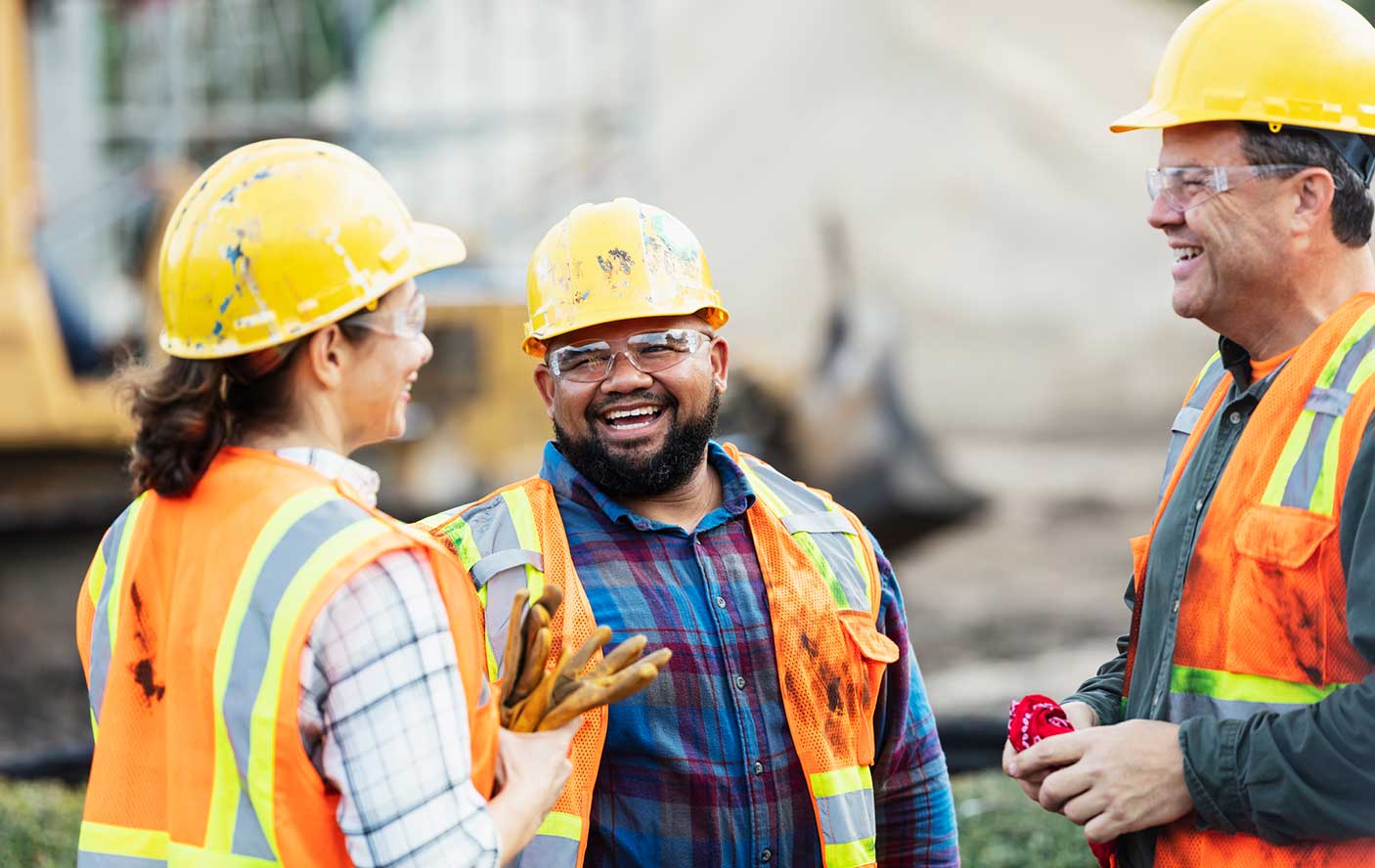 Three workers chatting