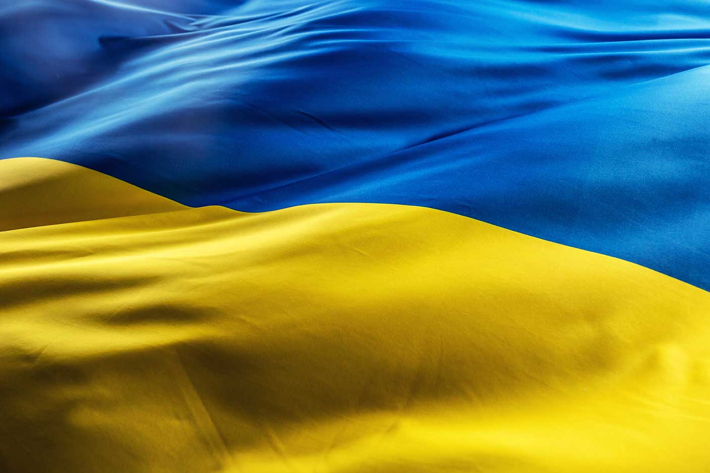 Ukrainian flag blowing in the morning light