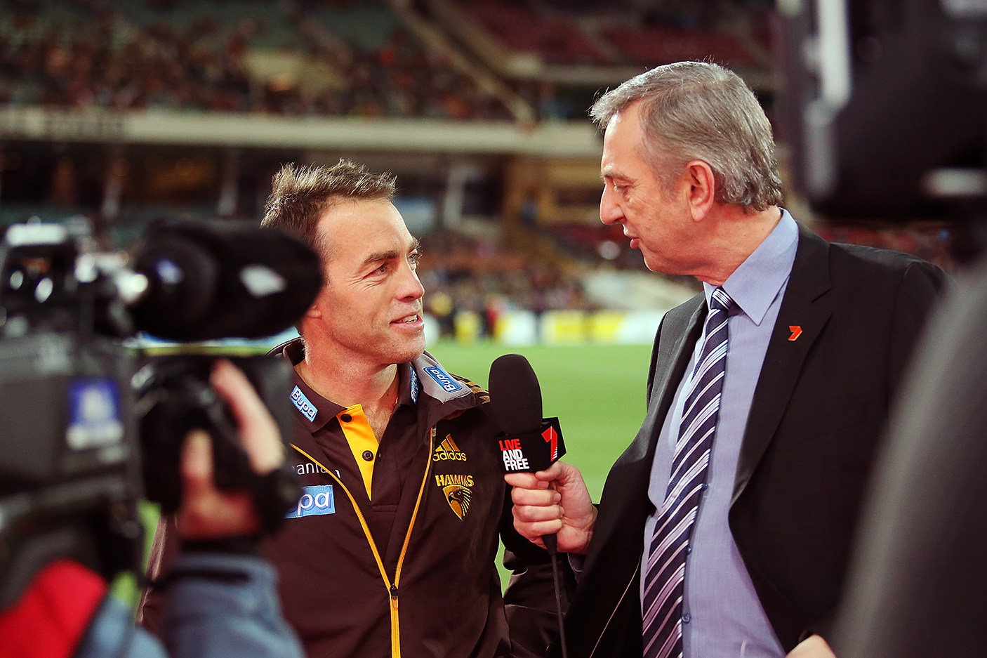  Alastair Clarkson of the Hawks is interviewed by Dennis Cometti before the round 17 AFL match