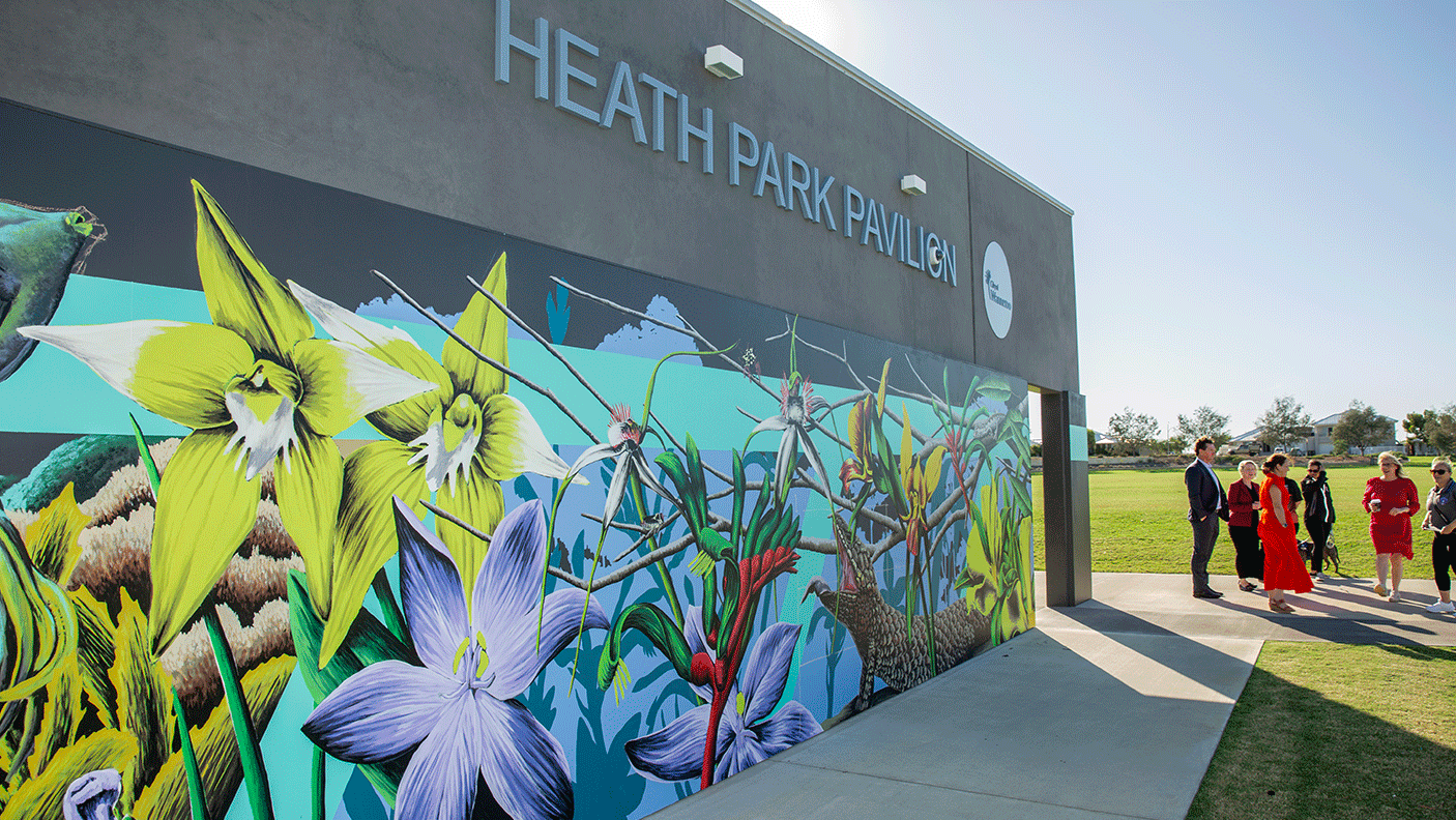 A mural of WA wildflowers on the outside wall of Heath Park Pavilion