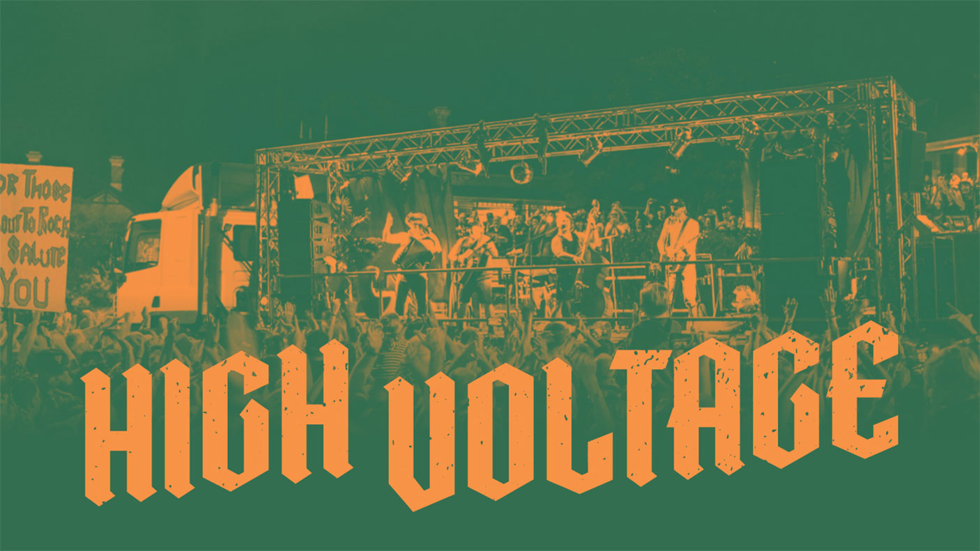 A stylised duo-tone image of a concert with the words, 'High Voltage'.