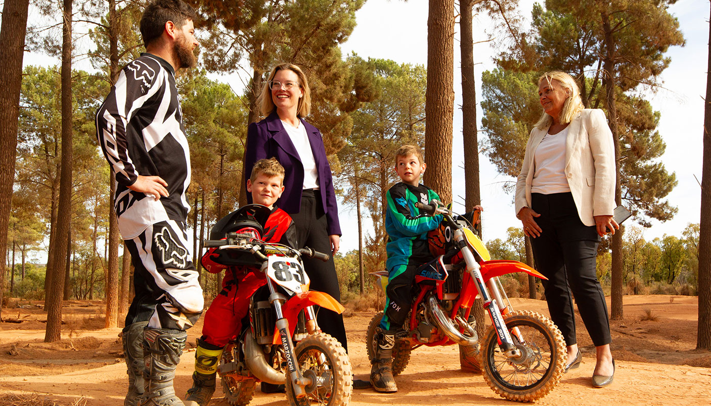 Local Government Minister Hannah Beazley MLA (centre) with motorcycle riding enthusiast Daniel Morgan (right) and his two sons Oscar (centre left) and Zander (centre right), and Wanneroo MLA, Sabine Winton (right)