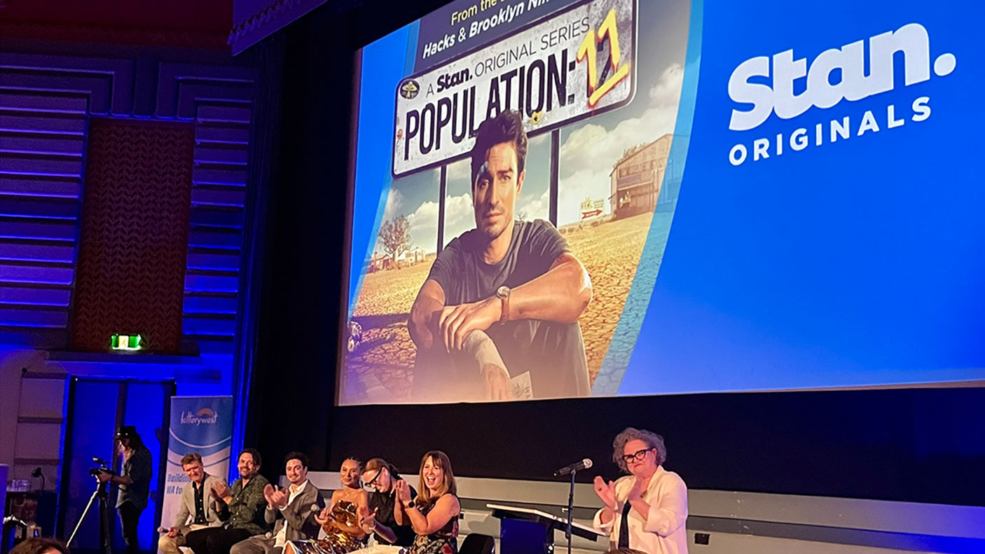 Cast and crew on the stage at the Premiere of Population : 11