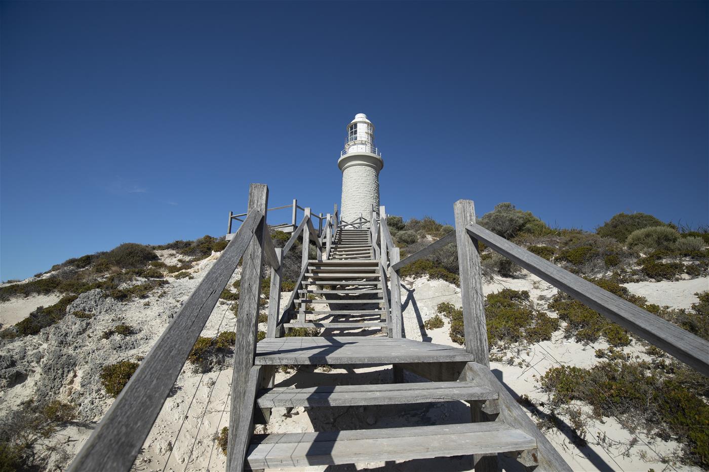 Rottnest Island Lighthouse on top of the steps from the beach.