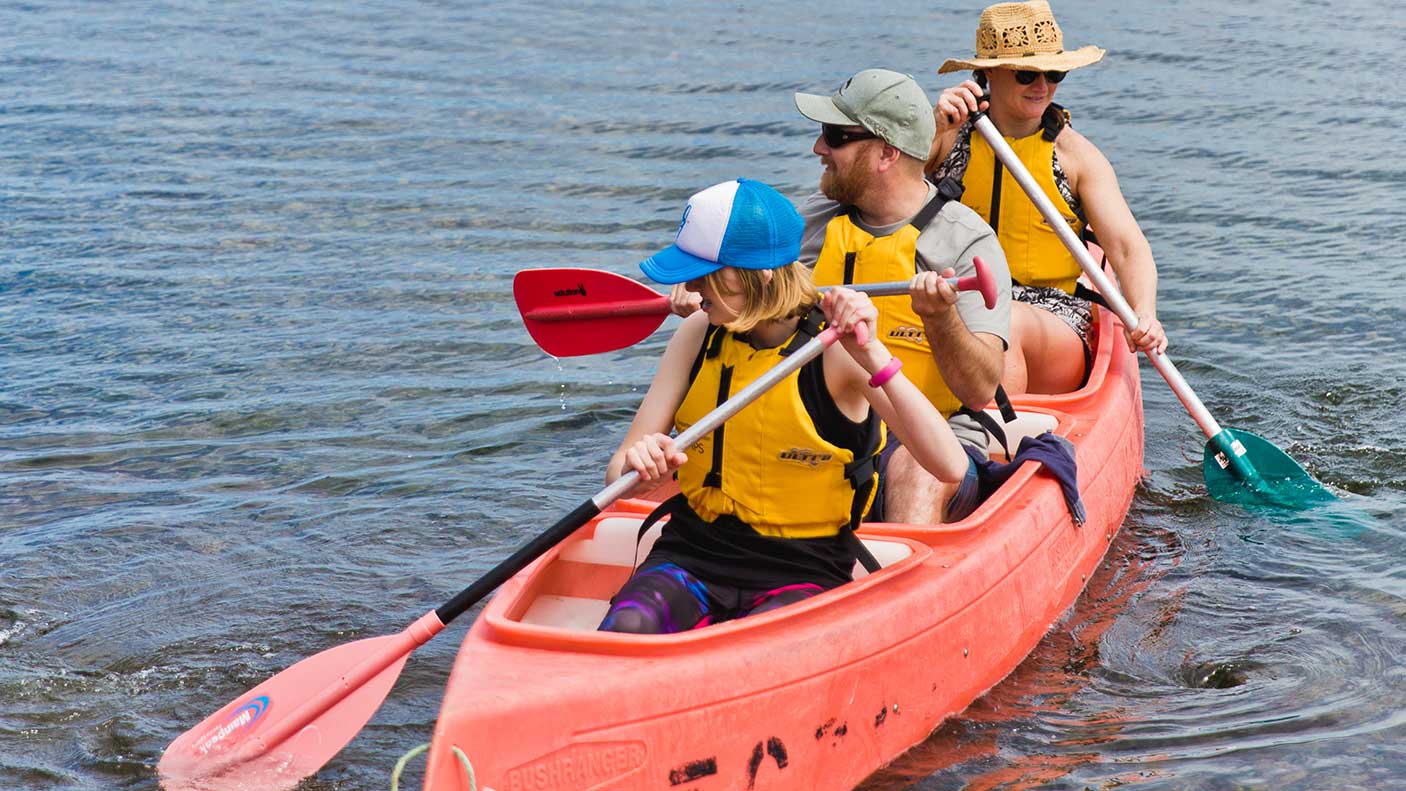 Three people in a canoe