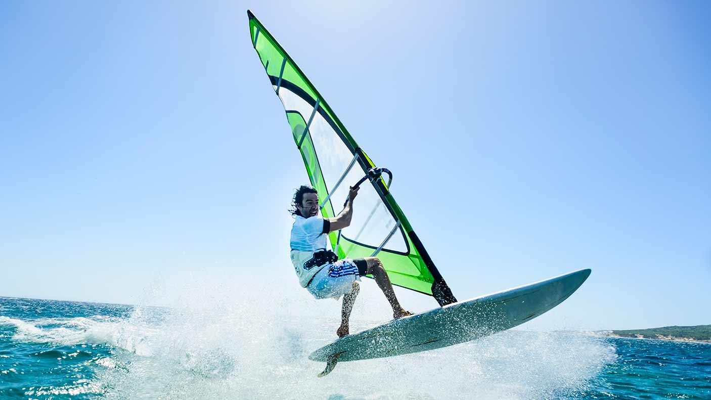 A man windsurfing. Credit: Ben Welsh Getty Images