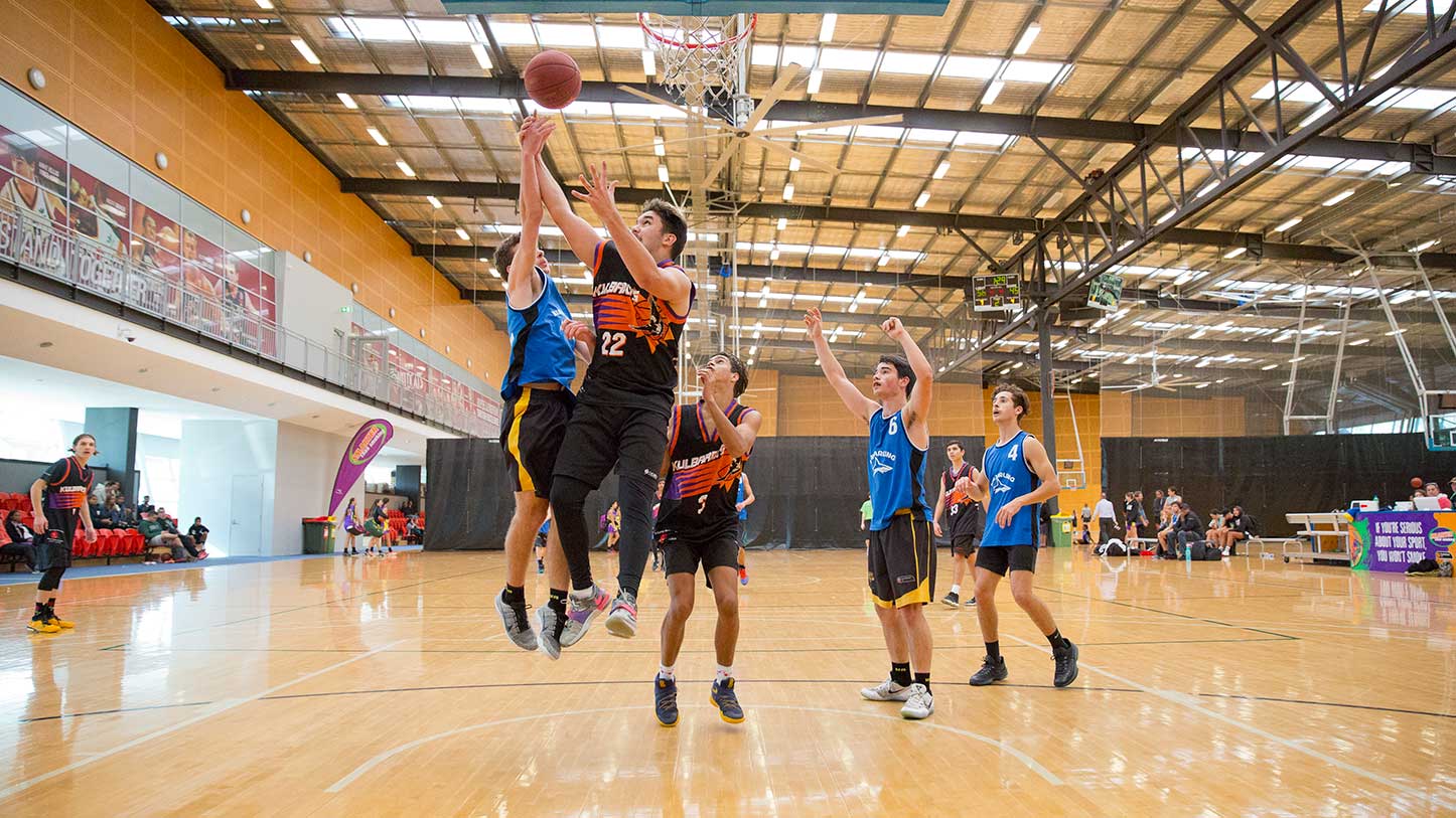 Basketball players at the Bendat Basketball Centre