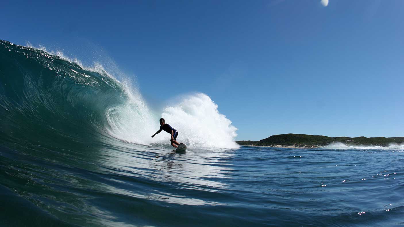 Surfer sets up for the tube in Western Australia