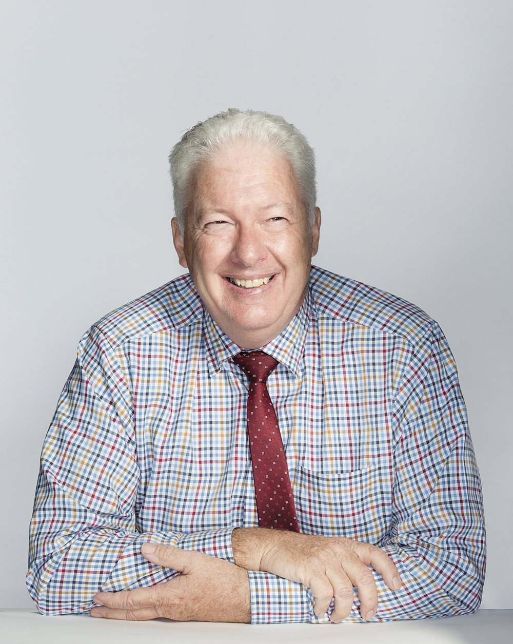 Portrait of Neil Kegie with a basketball