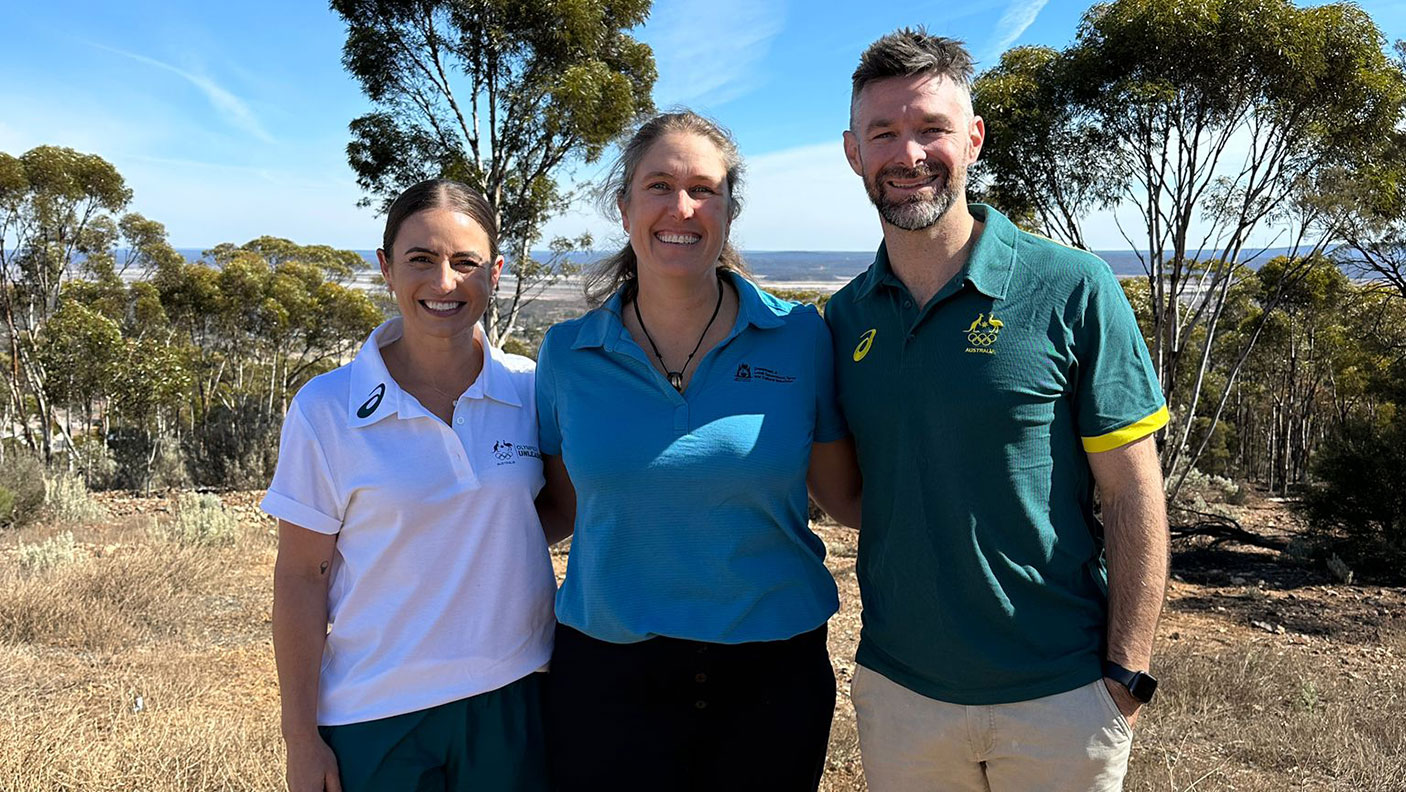 Jayde Taylor, Kelly Waterhouse and Trent Milton pose for the camera in the WA goldfields