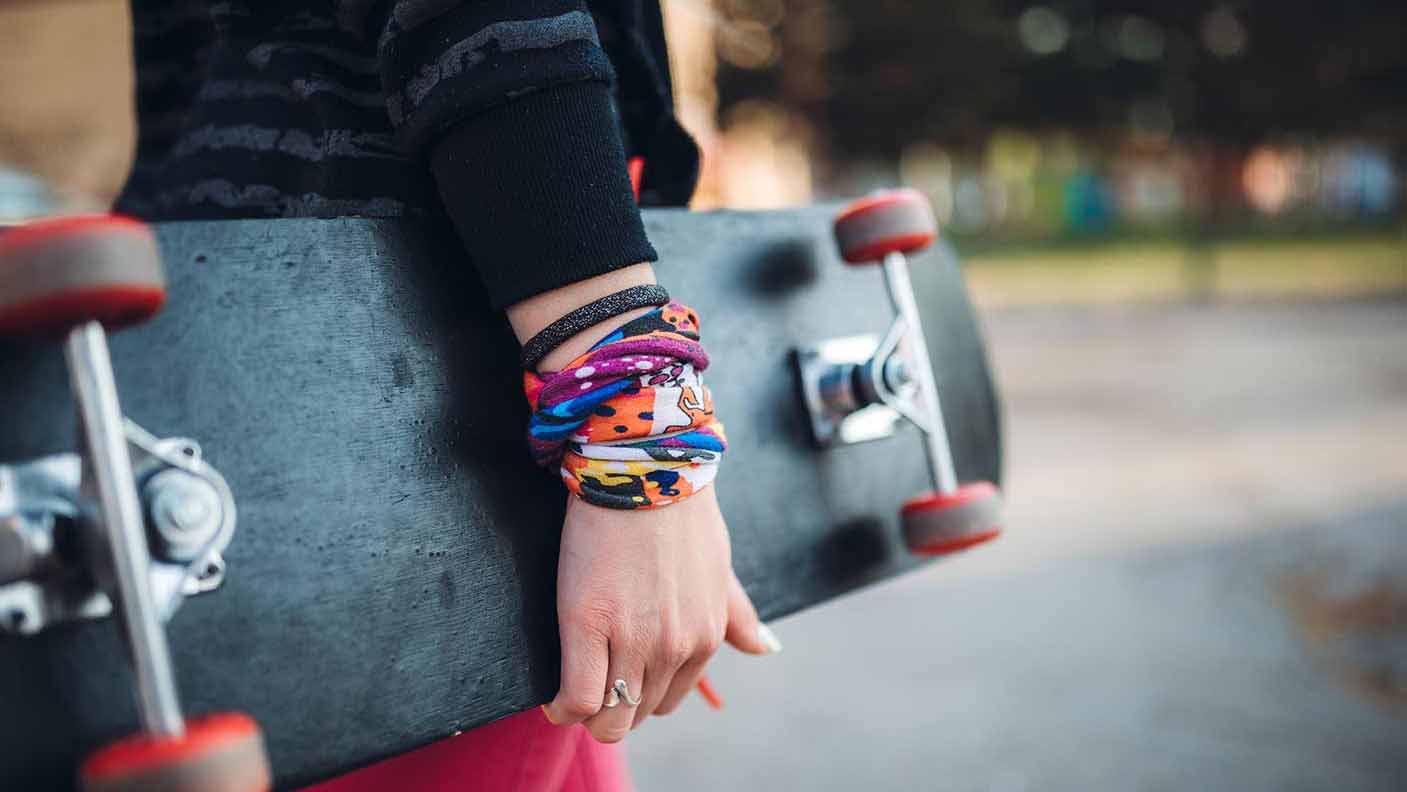 Young woman with skateboard